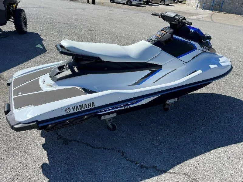 Slide: The Image of 2017 Yamaha WaveRunner EX Sport jet ski parked on pavement. - 19