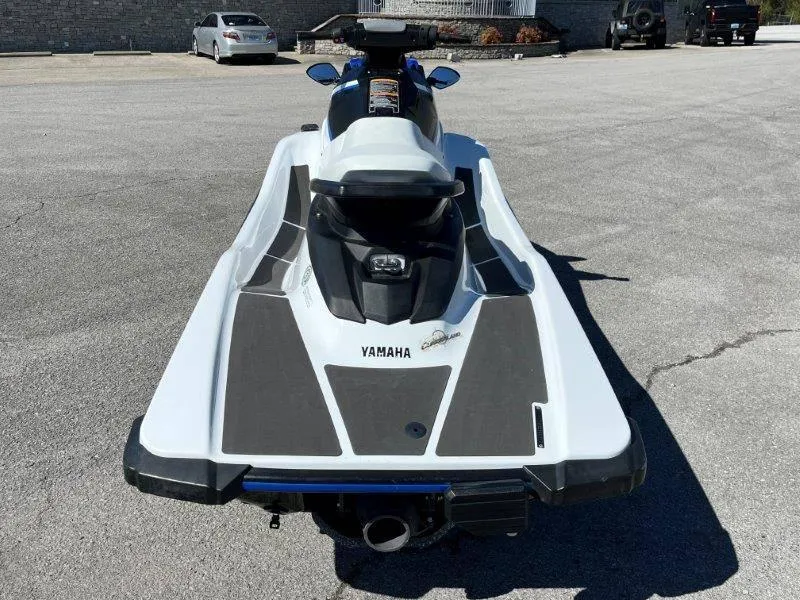 Slide: The Image of 2017 Yamaha WaveRunner EX Sport jet ski, rear view, parked on pavement. - 22