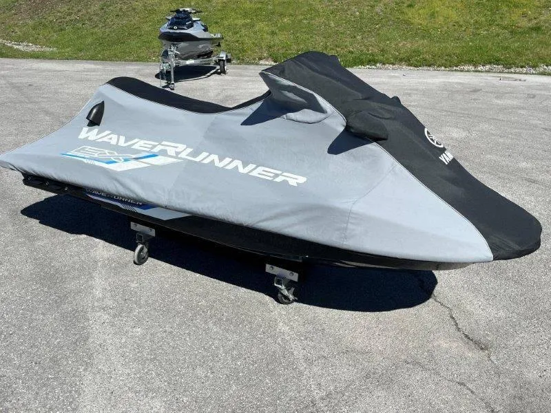 Slide: The Image of 2017 Yamaha WaveRunner EX Sport covered, parked on pavement. - 33