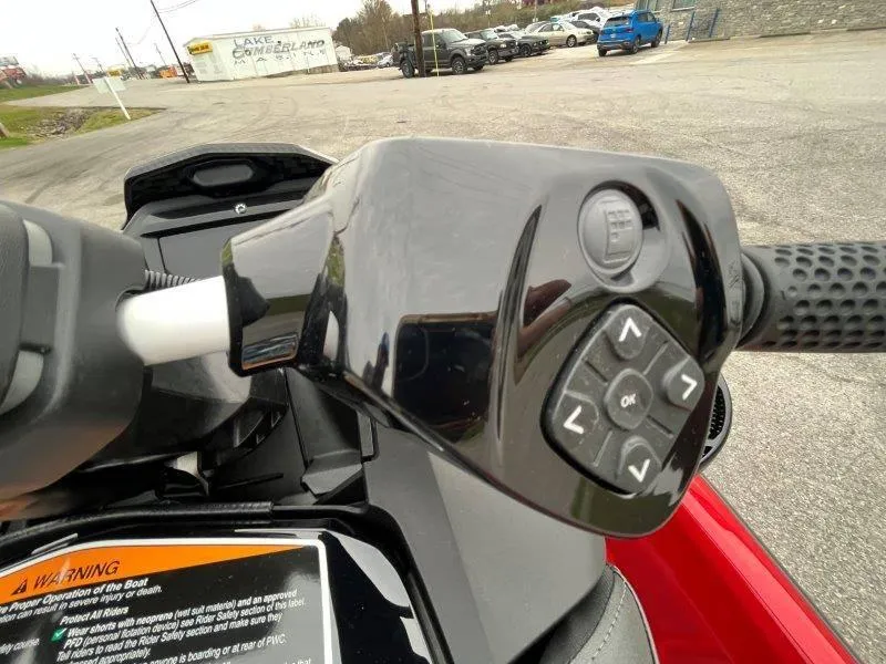 Slide: The Image of 2024 Sea-Doo RXP-X 325 Sound handlebar controls, close-up view. - 38