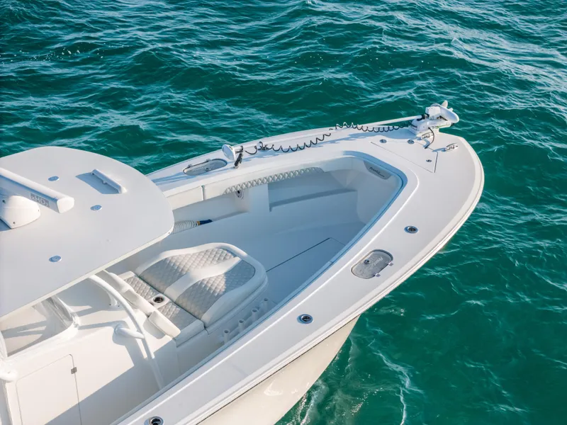 Slide: The Image of 2023 Front Runner 39 Center Console boat on clear blue water. - 15