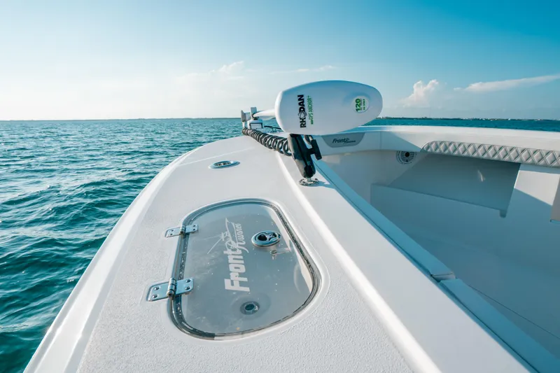Slide: The Image of 2023 Front Runner 39 Center Console boat on open water, clear sky. - 17