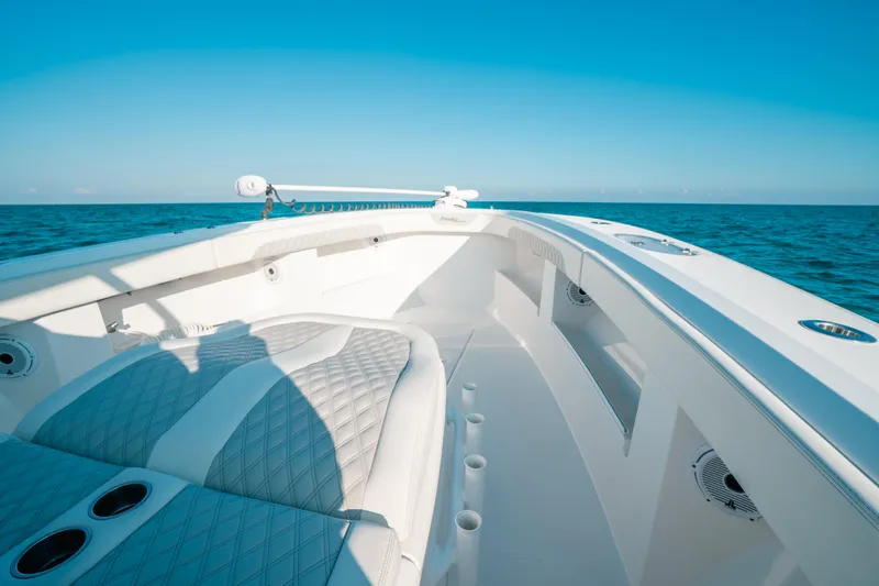 Slide: The Image of 2023 Front Runner 39 Center Console boat on open sea, featuring sleek design and spacious deck. - 18