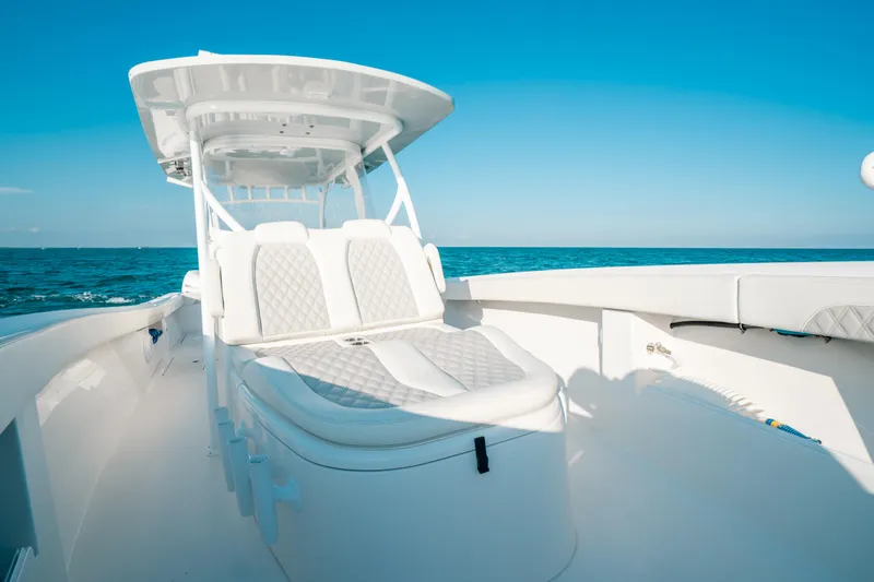 Slide: The Image of 2023 Front Runner 39 Center Console boat on open sea, featuring sleek white design. - 20