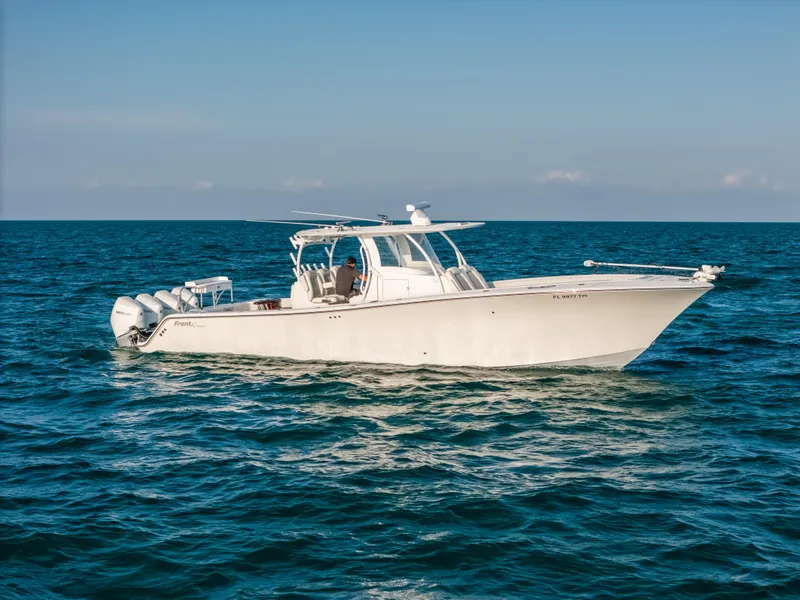 Slide: The Image of 2023 Front Runner 39 Center Console boat cruising on open water. - 21