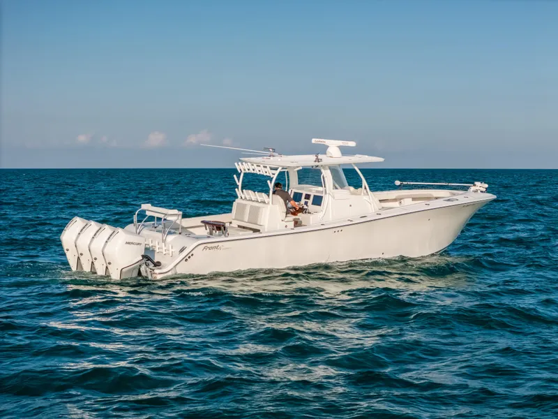 Slide: The Image of 2023 Front Runner 39 Center Console boat cruising on open water. - 22
