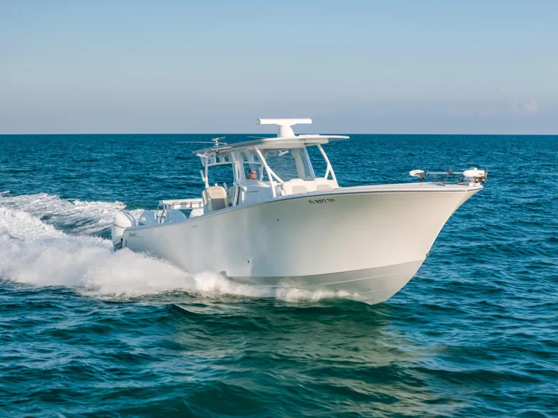 Slide: The Image of 2023 Front Runner 39 Center Console boat cruising on open sea. - 23