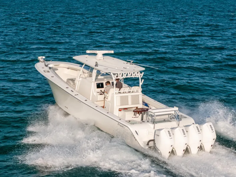Slide: The Image of 2023 Front Runner 39 Center Console boat cruising on open water. - 26
