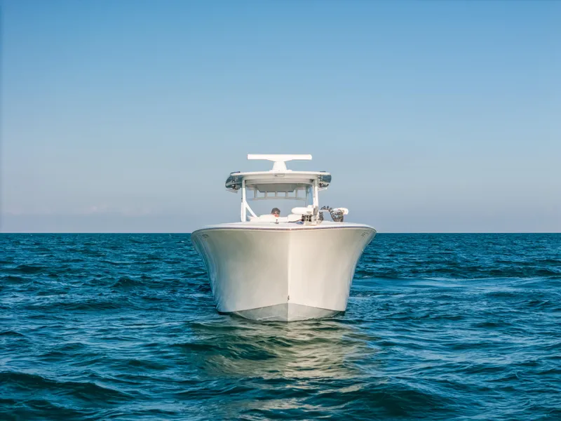 Slide: The Image of 2023 Front Runner 39 Center Console boat on open sea, front view. - 28