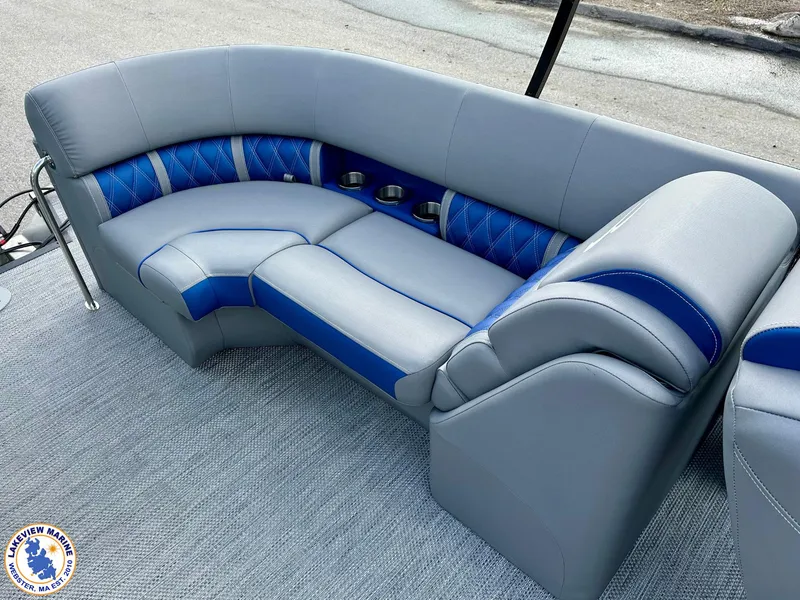 Slide: The Image of 2024 Bennington 23 LXFB boat interior with gray and blue seating. - 6