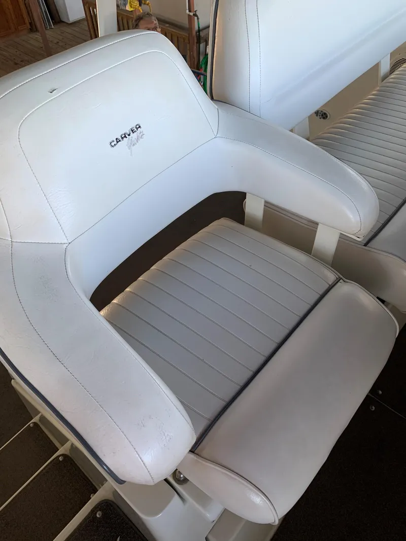 Slide: The Image of White captain's chair on 1994 Carver 350 Aft Cabin boat. - 13