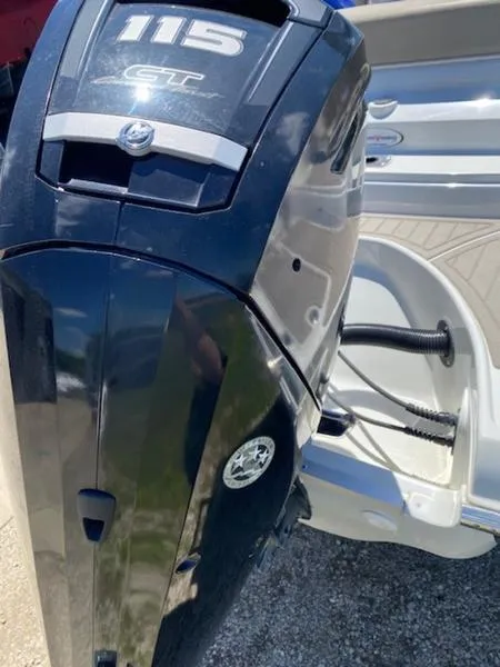 Slide: The Image of 2019 Crownline E 205 XS boat with a 115 HP outboard motor. - 4