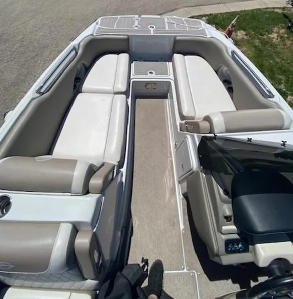 Slide: The Image of 2019 Crownline E 205 XS boat interior with spacious seating and modern design. - 9