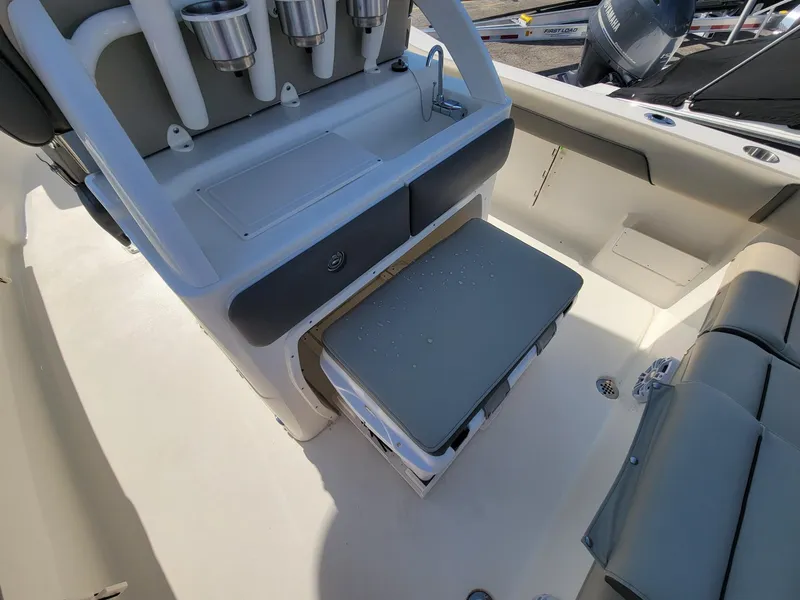 Slide: The Image of 2025 Key West 239 FSR boat interior with seating and storage features. - 21