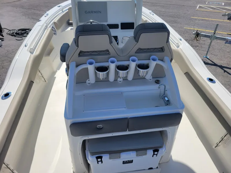 Slide: The Image of 2025 Key West 239 FSR boat interior with seating and console. - 7