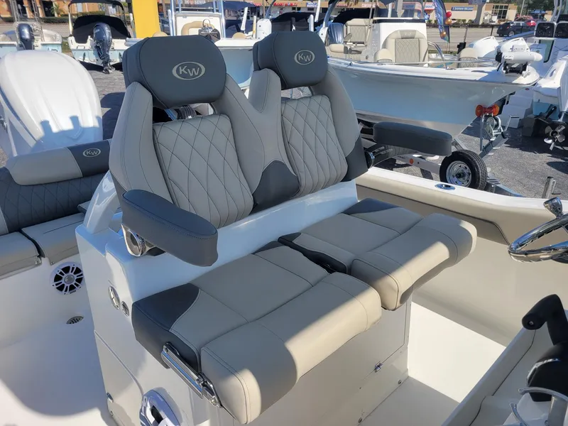 Slide: The Image of 2025 Key West 239 FSR boat seats with quilted design and armrests. - 9