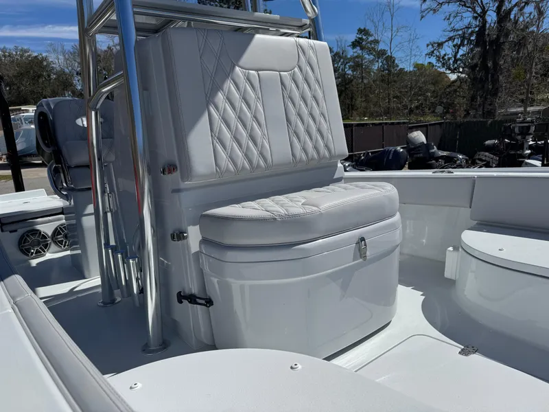 Slide: The Image of 2025 Contender 26 Bay boat interior with cushioned seating and sleek design. - 18