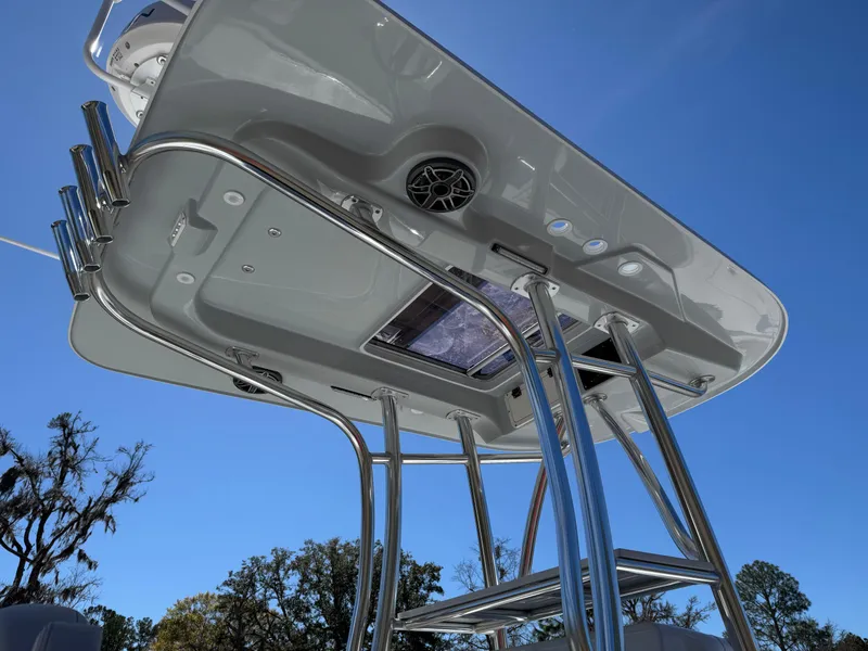 Slide: The Image of 2025 Contender 26 Bay boat's T-top with sleek design and sturdy metal framework. - 21