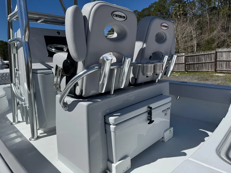 Slide: The Image of 2025 Contender 26 Bay boat interior with seating and storage compartments. - 22