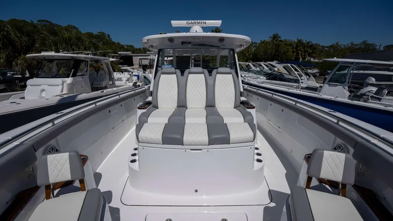 Slide: The Image of 2025 Everglades 455 CC boat with luxurious seating and modern design. - 14