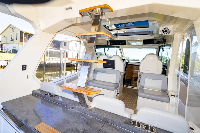 Slide: The Image of Luxurious interior of 2020 Scout 530LXF yacht with modern seating and sleek design. - 18