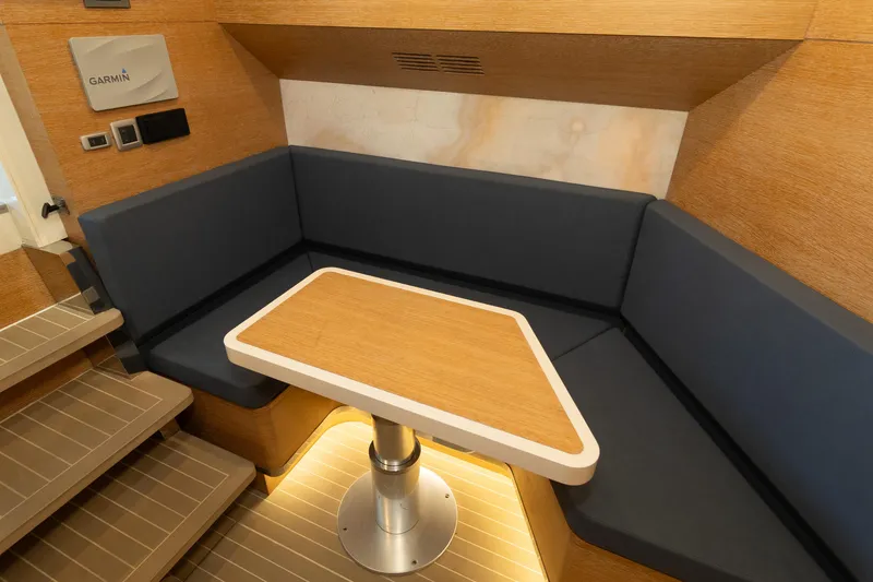 Slide: The Image of 2020 Scout 530LXF interior with cozy seating and wooden table. - 35
