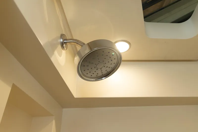 Slide: The Image of Showerhead in 2020 Scout 530LXF boat interior, featuring modern design and lighting. - 39