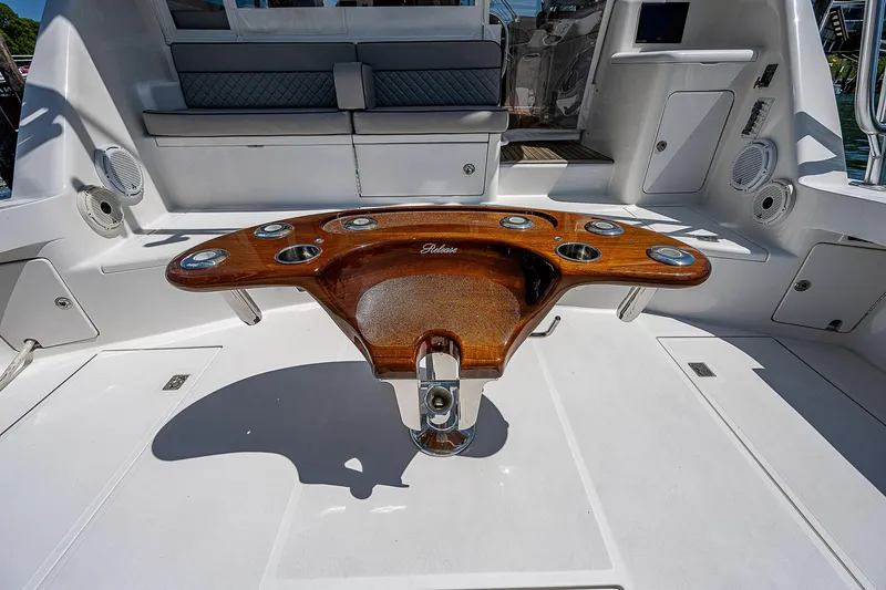 Slide: The Image of Luxury Cabo 44 HTX 2012 yacht cockpit with polished wooden fishing station. - 46