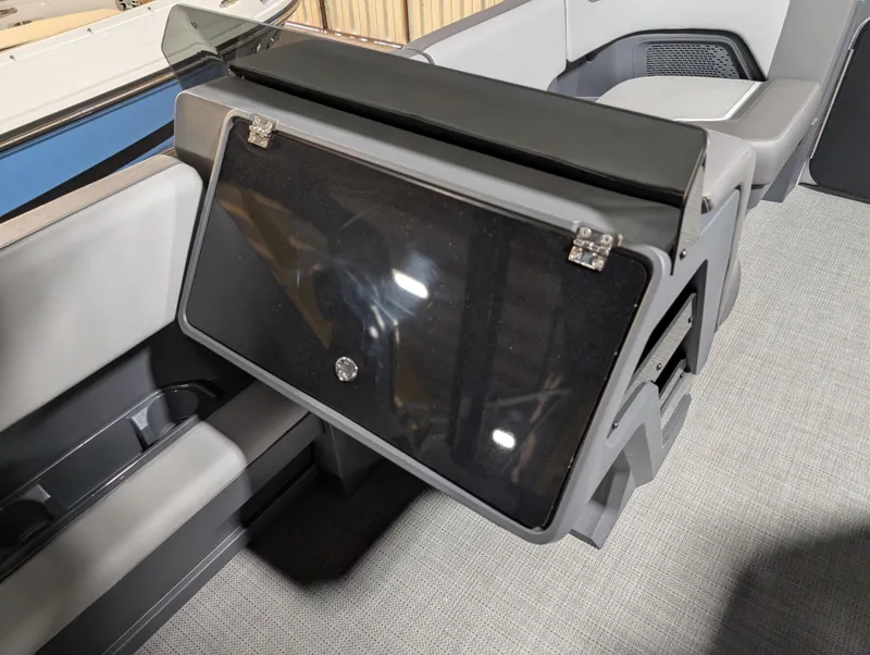 Slide: The Image of 2025 Manitou Cruise boat interior with sleek seating and modern design. - 12