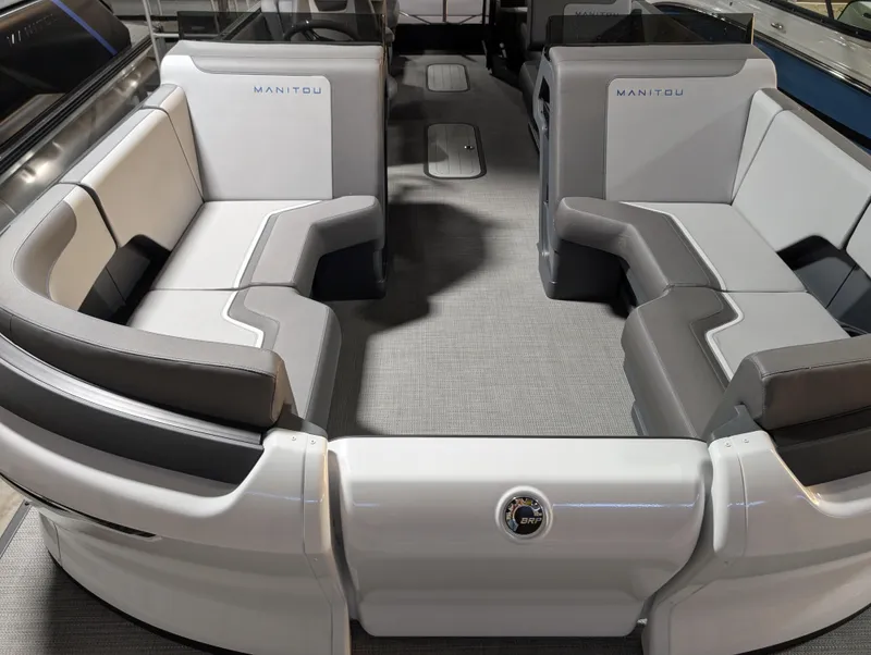 Slide: The Image of 2025 Manitou Cruise boat interior with modern seating and sleek design. - 6