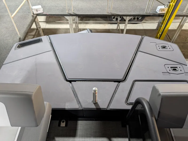 Slide: The Image of 2025 Manitou Cruise boat deck with modern design and seating arrangement. - 9