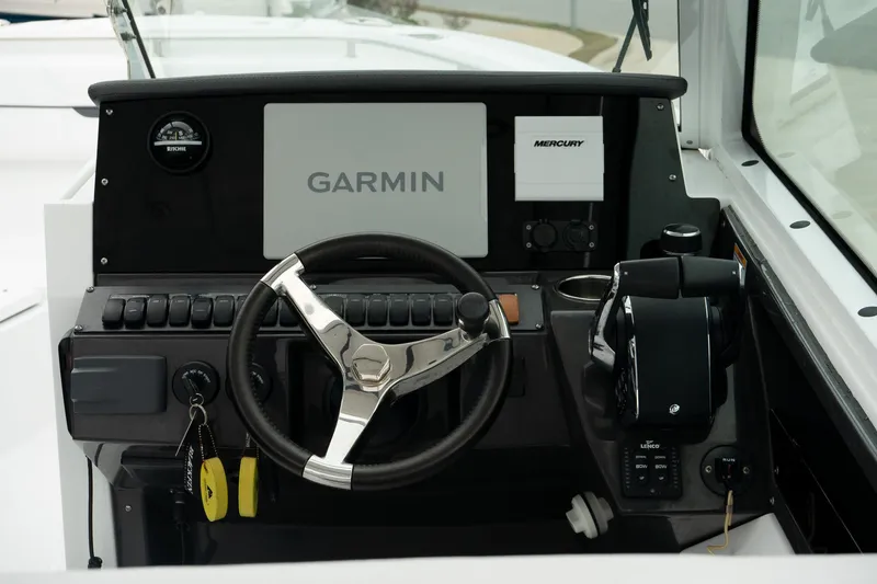 Slide: The Image of Dashboard of 2023 Blackfin 272 DC boat with Garmin navigation system. - 21