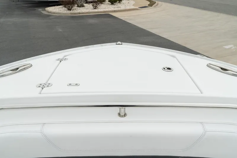 Slide: The Image of 2023 Blackfin 272 DC boat deck, featuring sleek white design and modern fittings. - 28