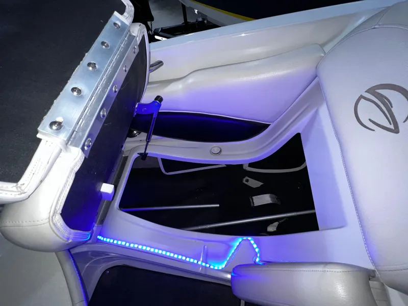 Slide: The Image of 2013 Crownline Eclipse E4 boat interior with illuminated seating and sleek design. - 15