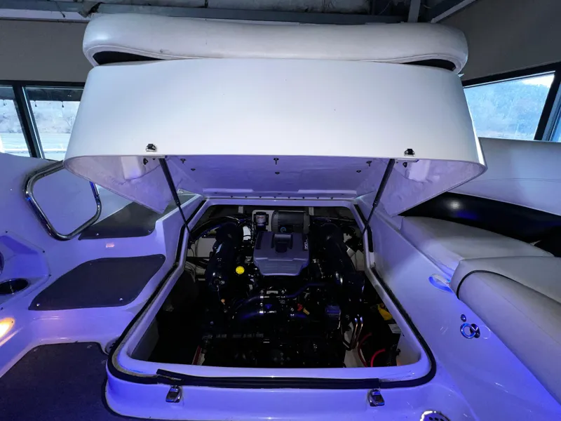 Slide: The Image of 2013 Crownline Eclipse E4 boat engine compartment with open hatch. - 20
