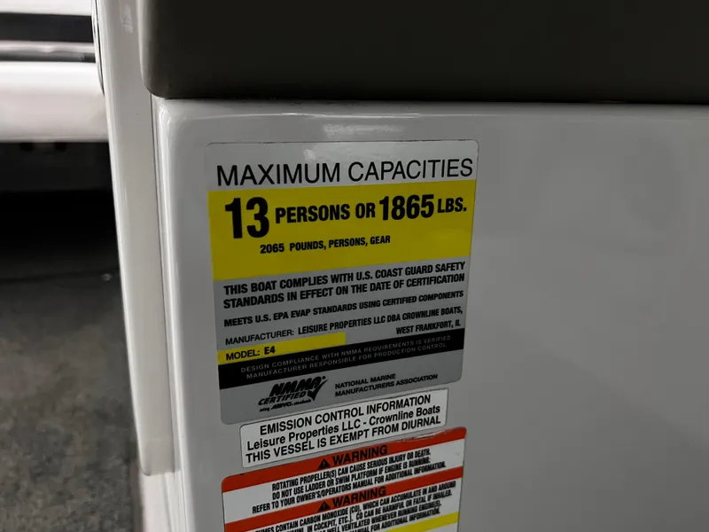 Slide: The Image of Capacity label on 2013 Crownline Eclipse E4 boat, max 13 persons or 1865 lbs. - 26