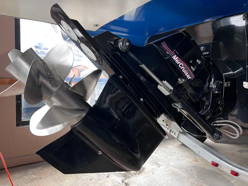 Slide: The Image of 2013 Crownline Eclipse E4 boat with MerCruiser outdrive and stainless steel propeller. - 6