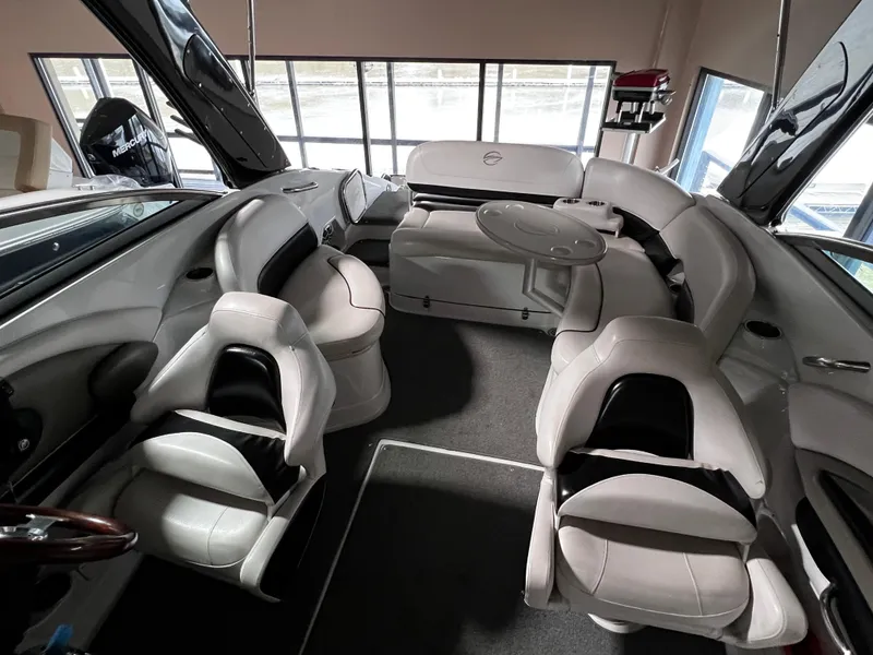 Slide: The Image of 2013 Crownline Eclipse E4 boat interior with white seating and modern design. - 8