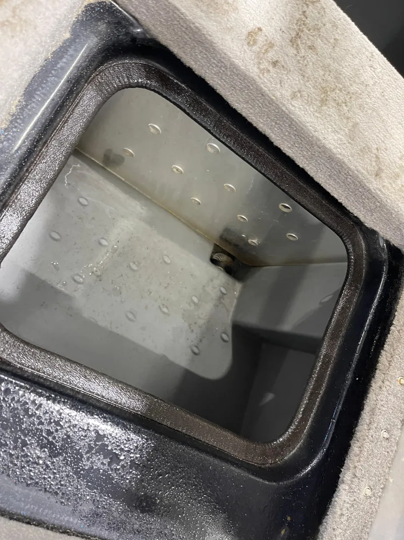 Slide: The Image of Interior compartment of a 2009 Triton 18 HP Explorer boat. - 23