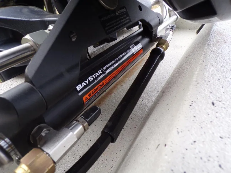 Slide: The Image of BayStar hydraulic steering system on 2025 Xpress H20BAY boat. - 2