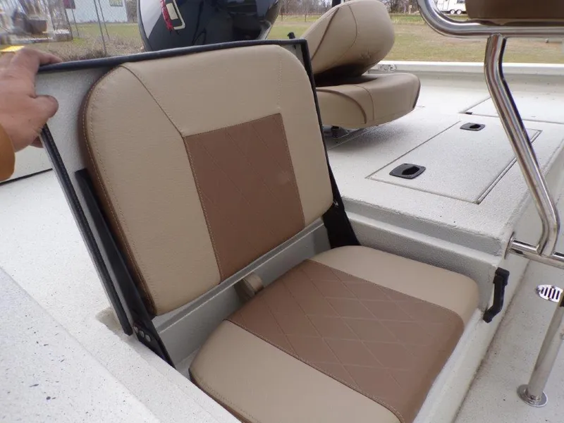 Slide: The Image of 2025 Xpress H20BAY boat seat with beige and brown upholstery. - 6