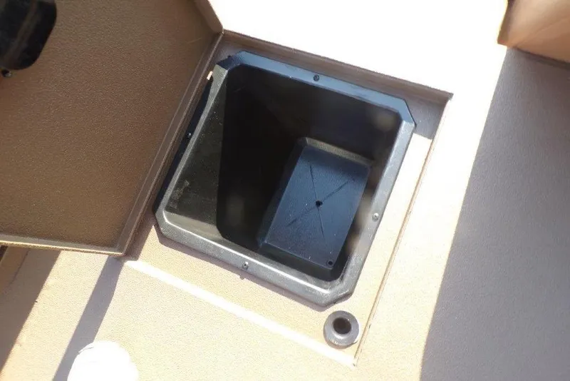 Slide: The Image of Open storage compartment in 2026 Xpress XP200 boat interior. - 14