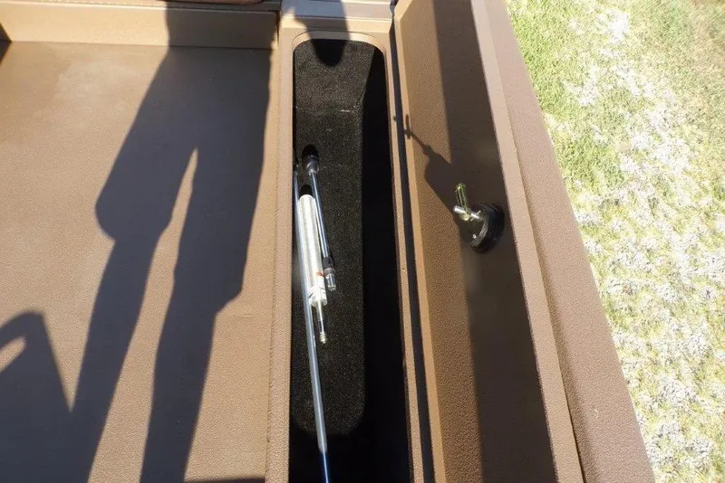 Slide: The Image of Storage compartment of 2026 Xpress XP200 boat with hydraulic lift mechanism. - 18