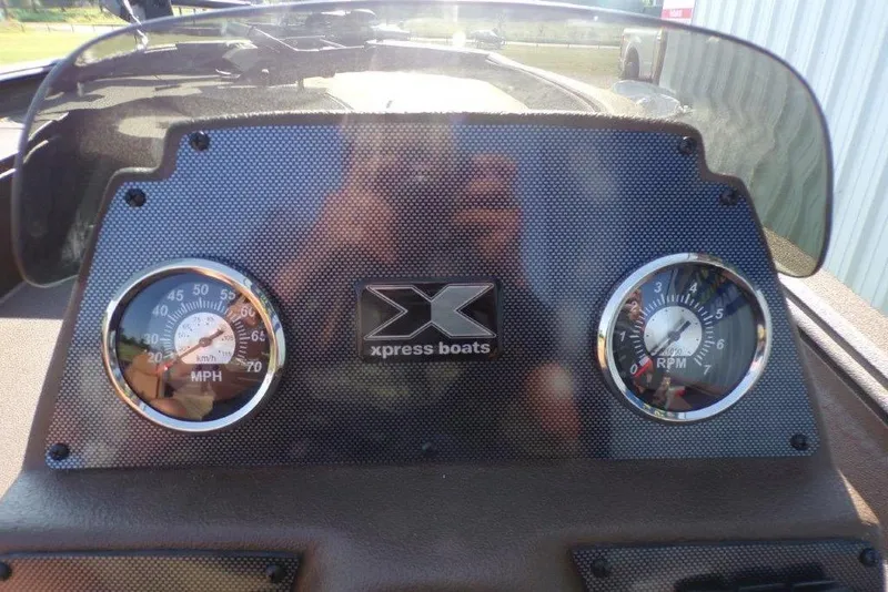 Slide: The Image of Dashboard of 2026 Xpress XP200 boat with speedometer and RPM gauges. - 24