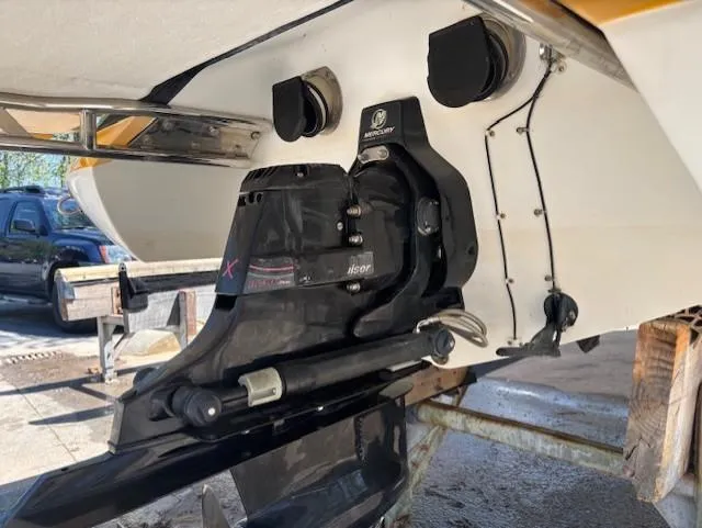 Slide: The Image of 2005 Cobalt 272 boat stern drive and propeller system in close-up view. - 17