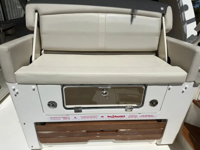 Slide: The Image of 2021 Boston Whaler Realm 380 boat seat with storage compartment. - 41