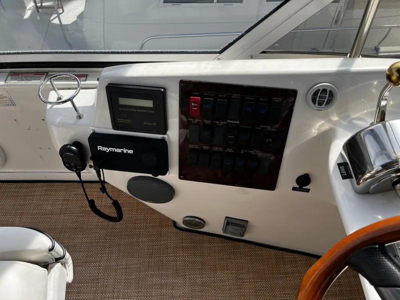 Slide: The Image of Control panel of a 2001 Sea Ray 420 Aft Cabin yacht with Raymarine equipment. - 20