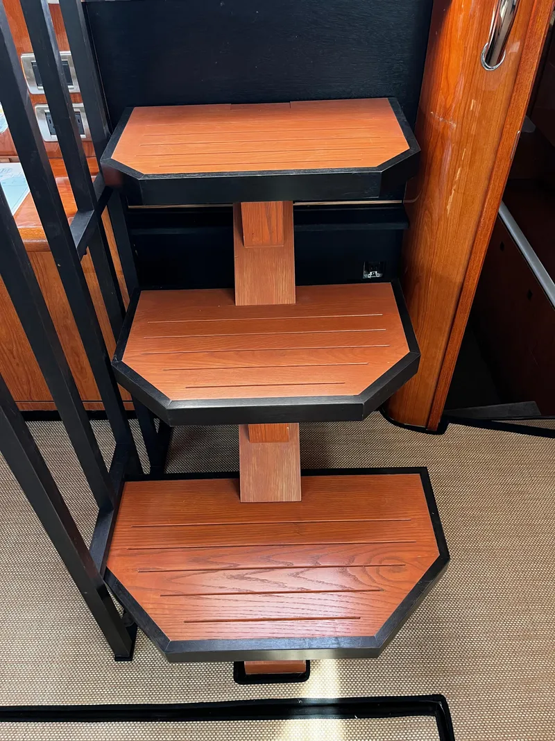 Slide: The Image of Wooden stairs inside a 2001 Sea Ray 420 Aft Cabin yacht. - 30