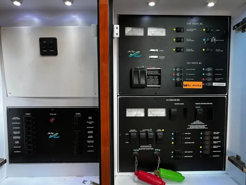 Slide: The Image of Electrical control panel of a 2001 Sea Ray 420 Aft Cabin yacht. - 49