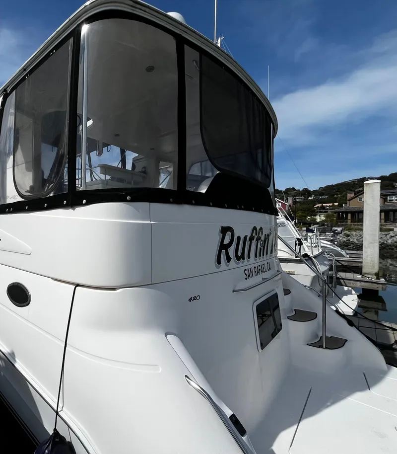 Slide: The Image of 2001 Sea Ray 420 Aft Cabin yacht docked, featuring sleek design and spacious aft cabin. - 5